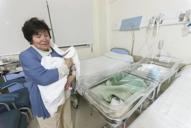  Mauricia con los mellizos 