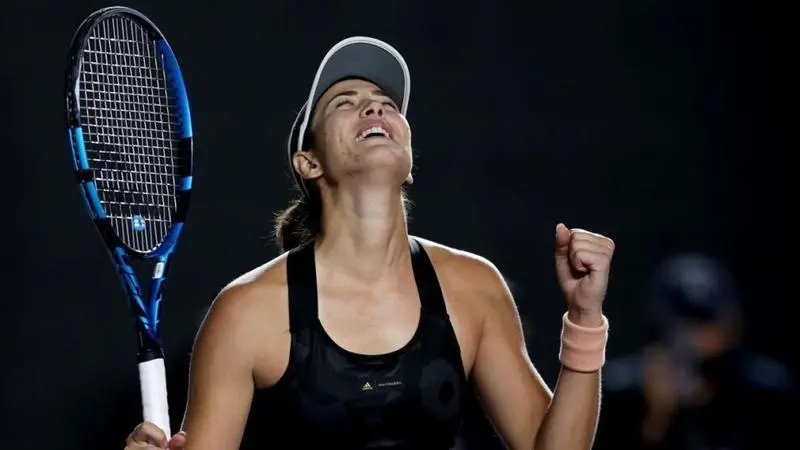 <p> Muguruza celebrando la victoria en la final ante Kontaveit </p>