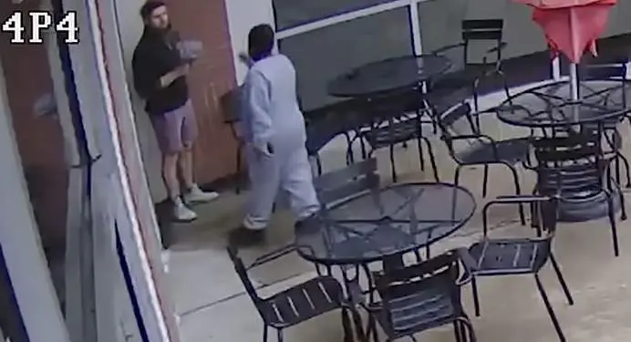  Kelvin Ellis and Matthew Busbice kindness on surveillance cam 