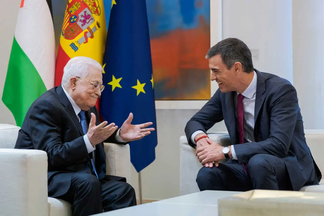 Palestinian President Mahmoud Abbas (L) and Spanish Prime Minister Pedro Sanchez (R) are seen during a meeting at Moncloa Palace in Madrid.