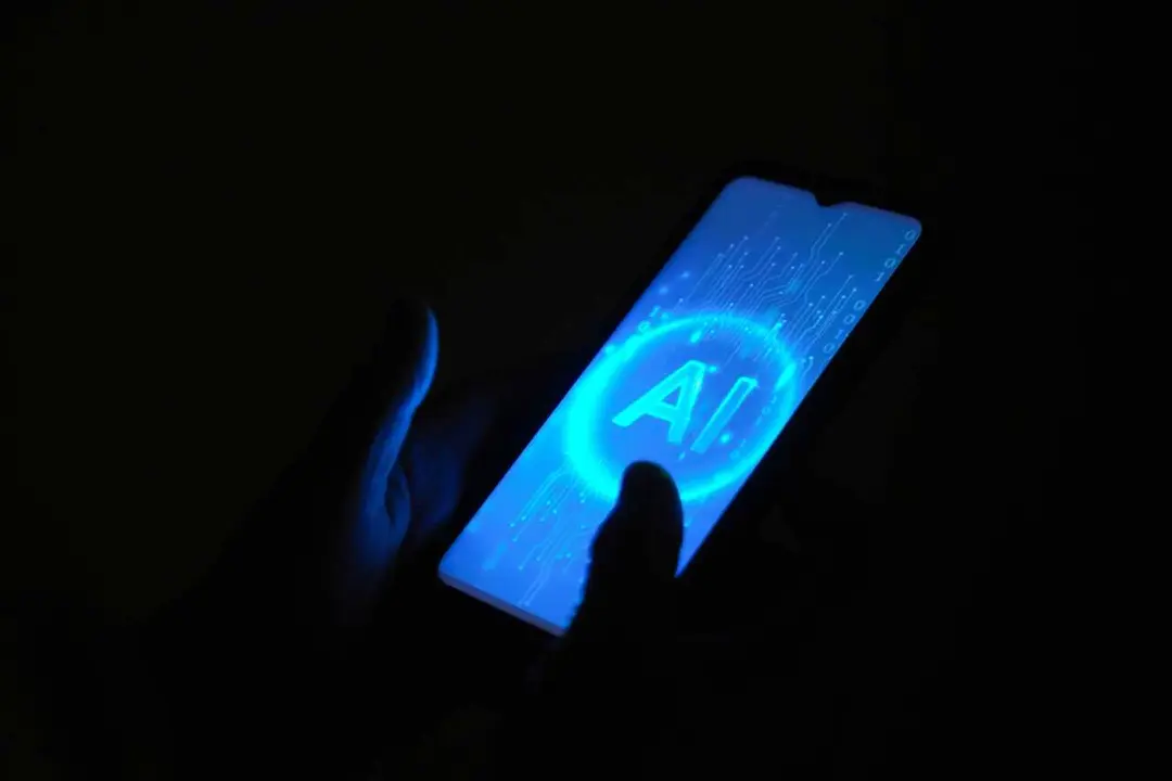 Archivo - Un m&oacute;vil con las siglas AI de Artificial Intelligence (Inteligencia Artificial)