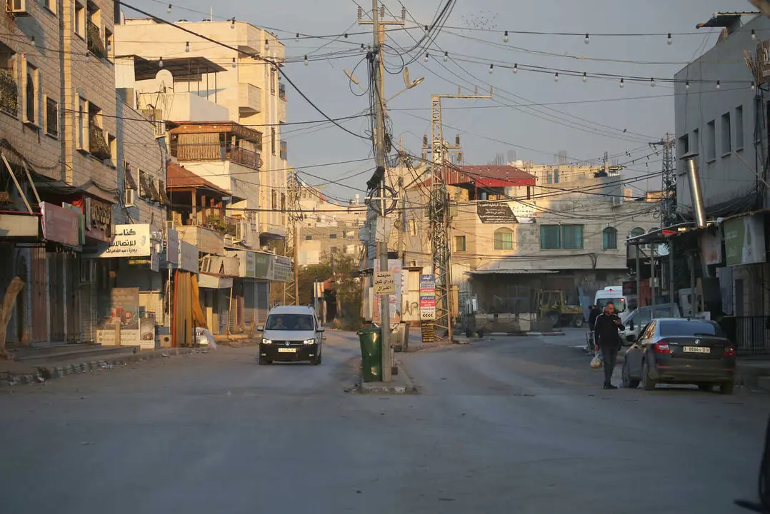 General view of the commercial market after the shops closed in the town of Qabatiya, south of Jenin in the northern West Bank. The Israeli army announced it was conducting operations in several locations in the West Bank following a Palestinian attack that killed an Israeli woman and wounded four others in the southern Israeli city of Beit She'an. The Israeli army raided the home of the Palestinian attacker in Qabatiya, and the Israeli Defense Minister ordered the army to carry out a large-scale operation and impose a siege on the town.