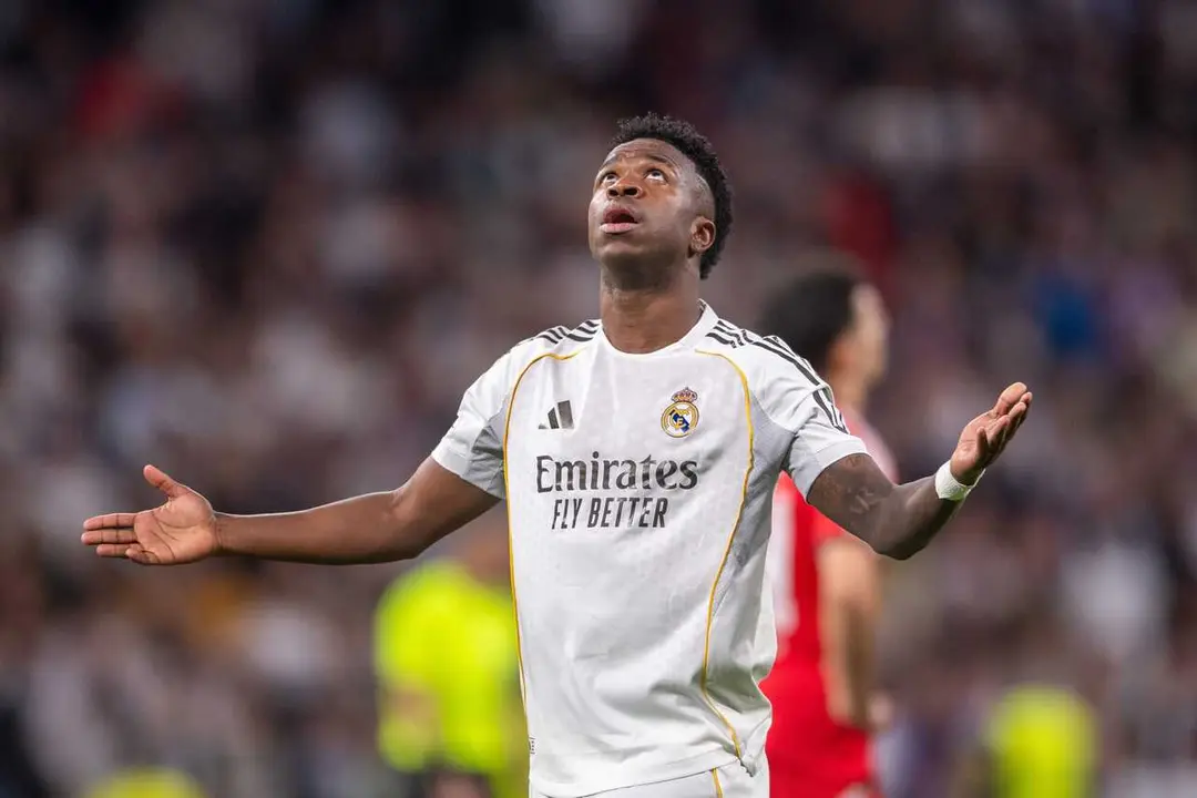 25 February 2026, Spain, Madrid: Real Madrid's Vinicius Junior celebrates scoring his side's second goal during the UEFA Champions League Knockout Play-off Second Leg soccer match between Real Madrid CF and SL Benfica at Estadio Santiago Bernabeu. Photo: 