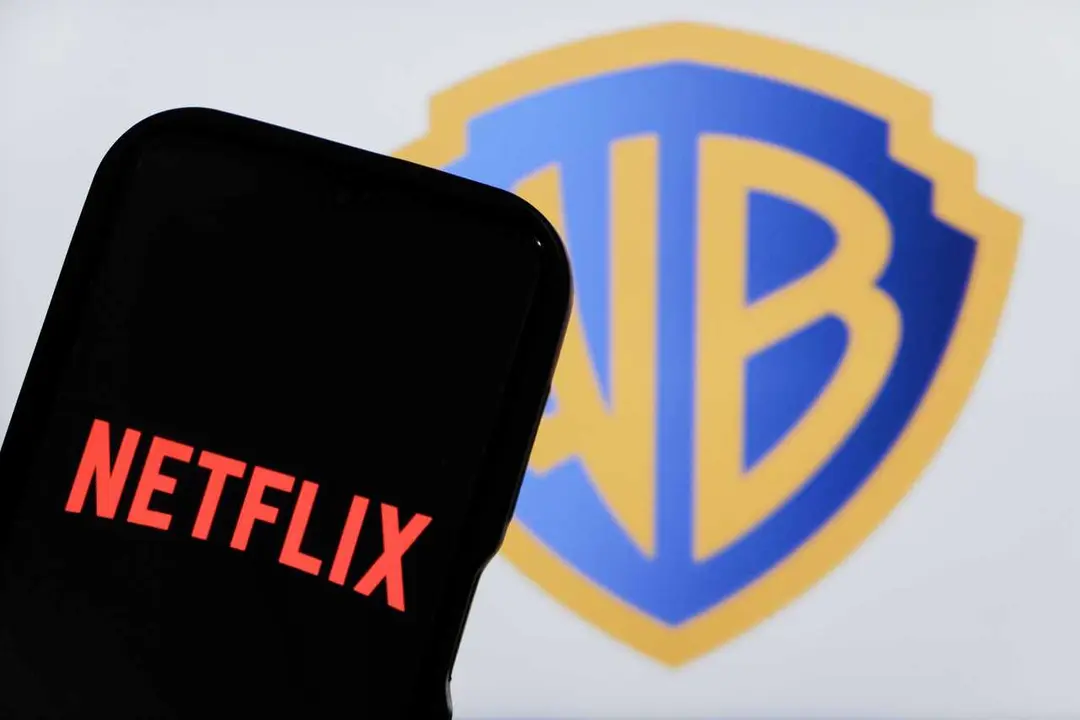 Archivo - Logos de WBD y Netflix