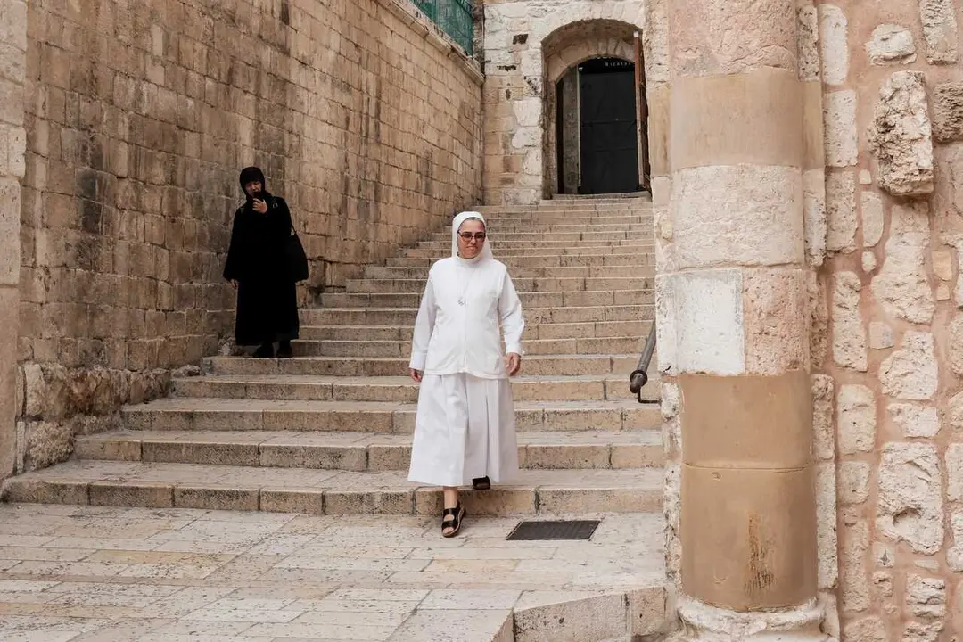 Faithful worshippers assemble at the Church of the Holy Sepulchre to partake in a mass offered for the eternal repose of the soul of Pope Francis at the Basilica of the Holy Sepulcher. The mass will be lead by the Latin Patriarch of Jerusalem, Cardinal Pierbattista Pizzaballa, who is considered among the candidates to succeed Pope Francis at the upcoming conclave.