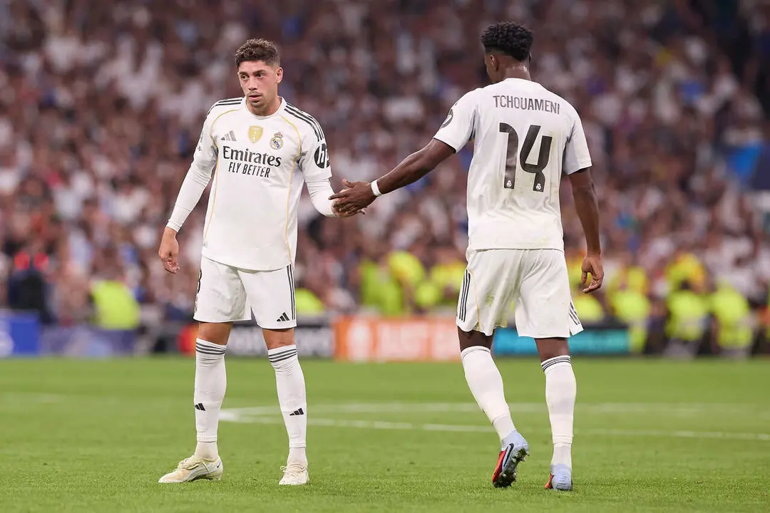 Federico Valverde (L) of Real Madrid CF and Aurelien Tchouameni (R) of Real Madrid CF are seen in action during the UEFA Champions League 2025/2026 first round day 1 football match between Real Madrid CF and Olympique de Marseille at Santiago Bernabeu Stadium. Final score: Real Madrid CF 2 : 1 Olympique de Marseille
