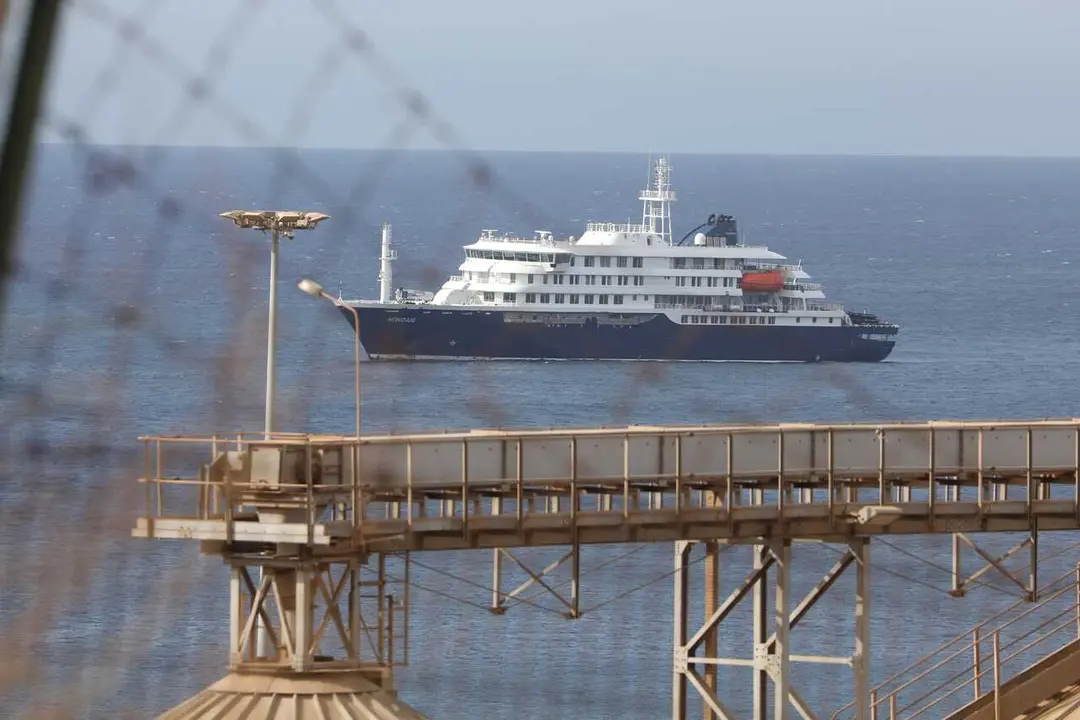 PRAIA, May 6, 2026  -- The Dutch cruise ship MV Hondius is anchored off Praia, Cabo Verde, May 6, 2026.   Cabo Verde on Wednesday carried out an air evacuation of three passengers suspected of hantavirus infection from the Dutch cruise ship MV Hondius, wh