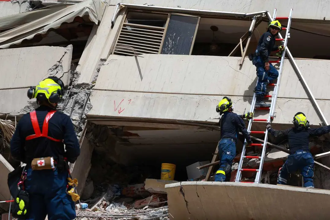 28 June 2026, Venezuela, La Guaira: Rescue workers from the German Federal Agency for Technical Relief (THW) conduct search and rescue operations in La Guaira a few days after the earthquakes that shook Venezuela. Photo: Javier Campos/dpa
