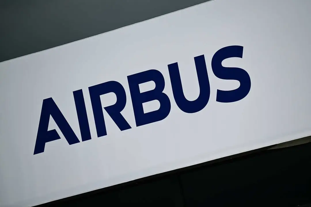 FILED - 12 June 2026, Brandenburg, Schoenefeld: FILE PHOTO - The 'Airbus' logo is visible on a building at the Berlin ExpoCenter Airport during the International Aerospace Exhibition (ILA). Photo: Sebastian Christoph Gollnow/dpa