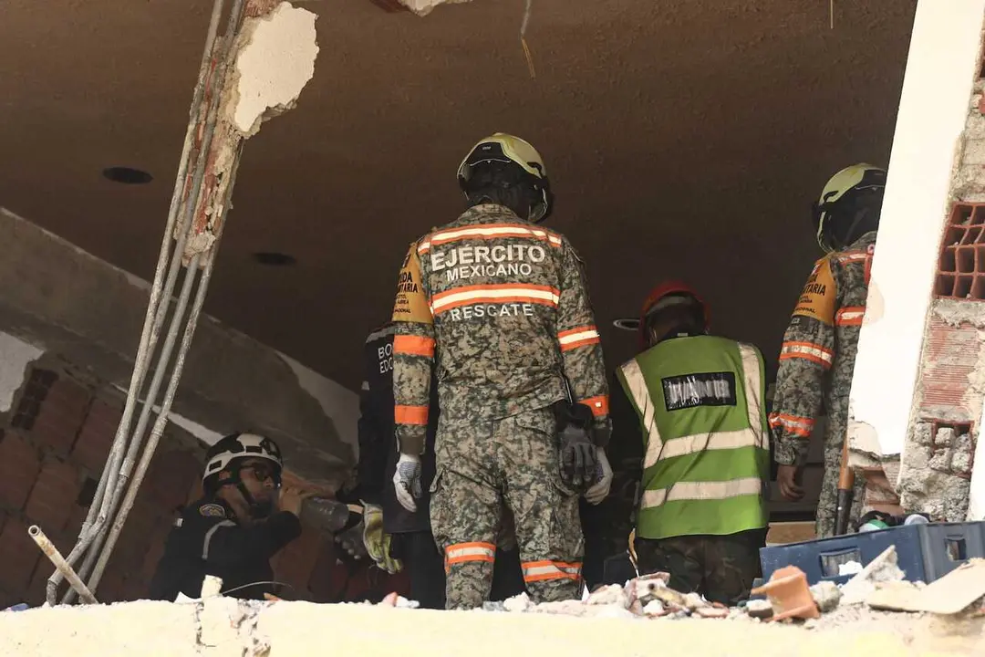 CARABALLEDA, LA GUAIRA, VENEZUELA &ndash; JULY 7, 2026: Rescue and forensic teams continue recovery operations in the aftermath of the devastating earthquakes that struck Venezuela's Caribbean coast, retrieving victims from the rubble of collapsed buildings in Caraballeda, La Guaira state. Authorities say the earthquakes have killed at least 3,685 people, injured more than 16,700, left thousands missing, and displaced nearly 18,000 residents, as search and recovery efforts continue in some of the hardest-hit areas. EDITOR'S NOTE: Images show covered bodies during recovery operations. Photo by Laura de Chiclana / JNA PRESS. (Photo by Laura de Chiclana/JNA Press via Nexpher Images)