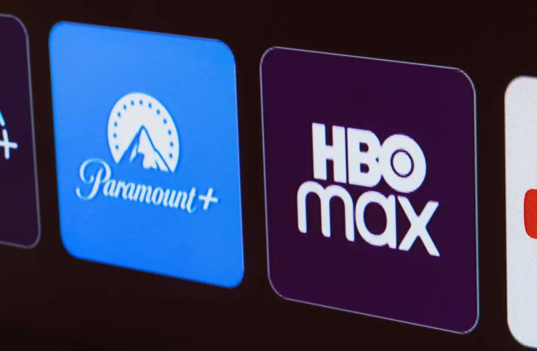 In this photo illustration the Apple TV, Disney Plus, Paramount Plus, HBO Max and YouTube logo is displayed on a TV screen.