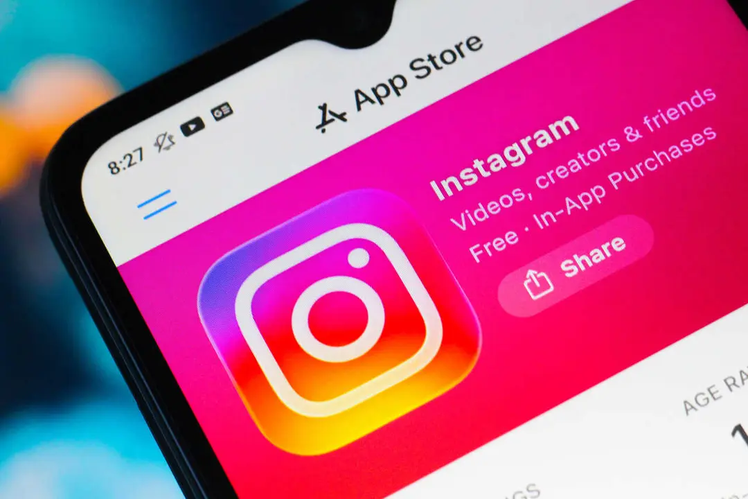 In this photo illustration, the Instagram logo is seen displayed on a smartphone screen in the Apple app store.