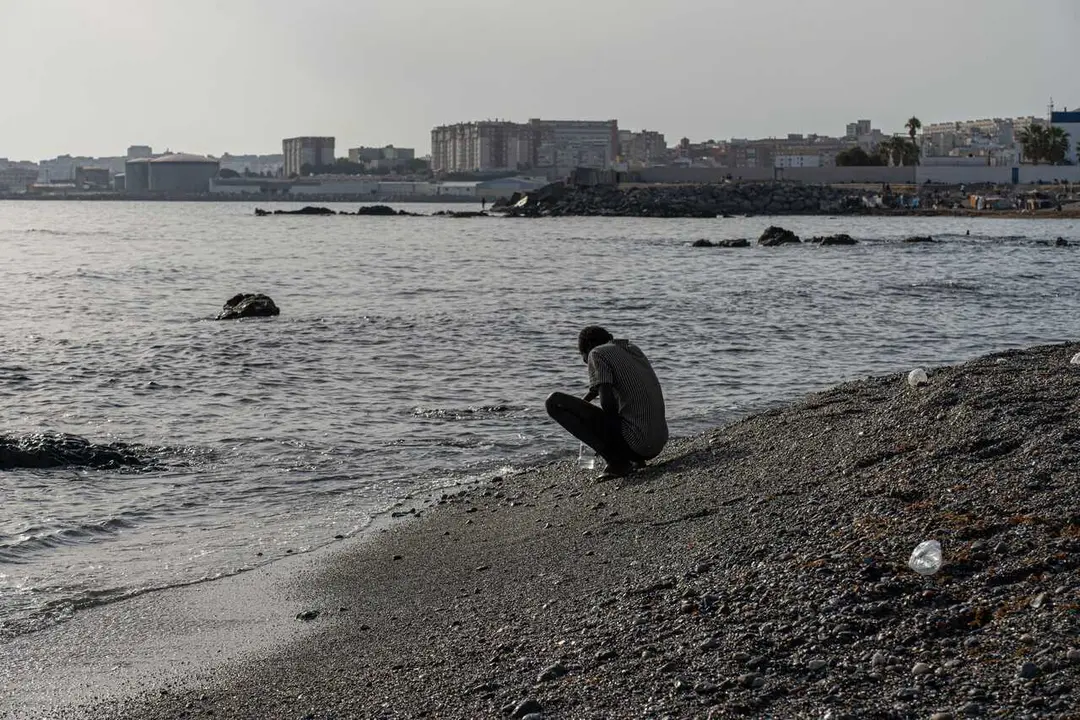CEUTA, SPAIN, AUGUST 20, 2026: Hundreds of migrants live in a makeshift settlement at Trampol&iacute;n Beach in Ceuta, using shelters built from reeds, plastic and other discarded materials. Photo by Claudio Palma / JNA Press.