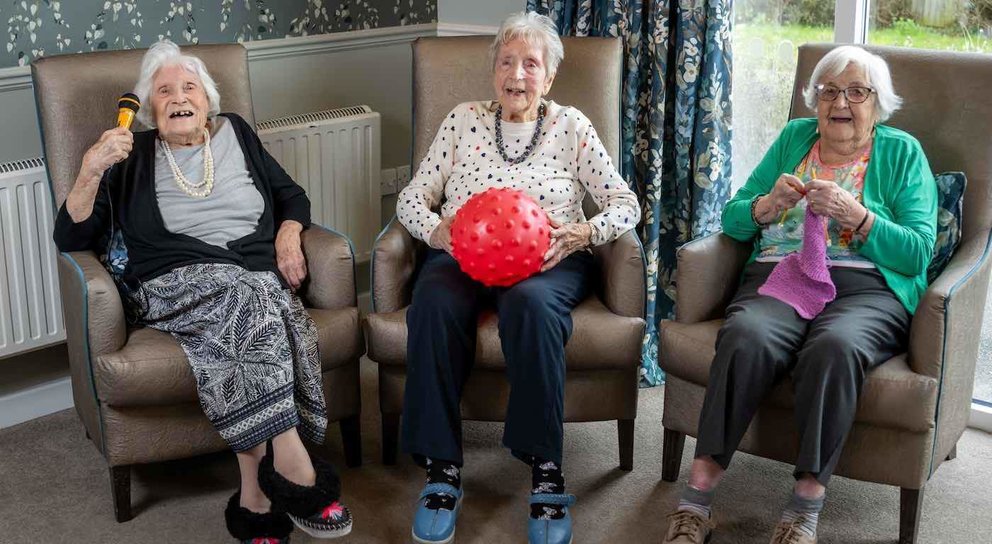  Centenarians at Care U.K’s Manor Lodge in Chelmsford Essex. L-r Irene Rankin age 101 , Daisy Taylor age 103 and Phyllis Cottrell 103  See SWNS story SWNAlife. Three friends all over 100 have revealed their secret to a long life - 'happiness, staying active - and keeping a toyboy nearby’. Daisy, 103, Irene, 101 and Phyllis, 103 say they still laughing and “enjoy life to the fullest”. Each woman has been through her own fair share of triumph and torture - World Wars, and loves had and lost. But the three pals who all live in the same care home have shared their advice on how to live to a century and enjoy the journey along the way.  