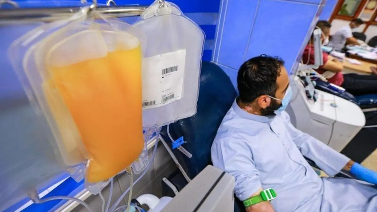  recovered coronavirus (COVID-19) patient donates blood samples for plasma extraction to help critically ill patients at the National Blood Transfusion Center. 