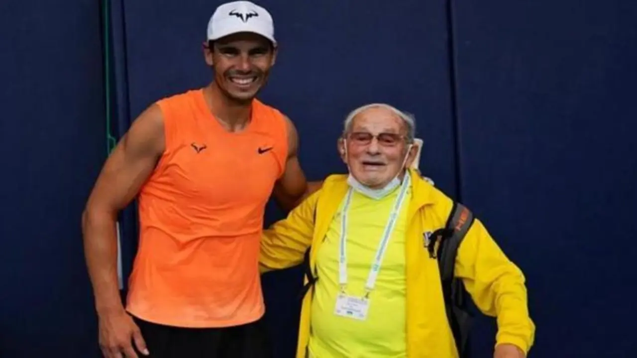 <p> Leonid Stanislavskyi junto a Rafa Nadal </p>