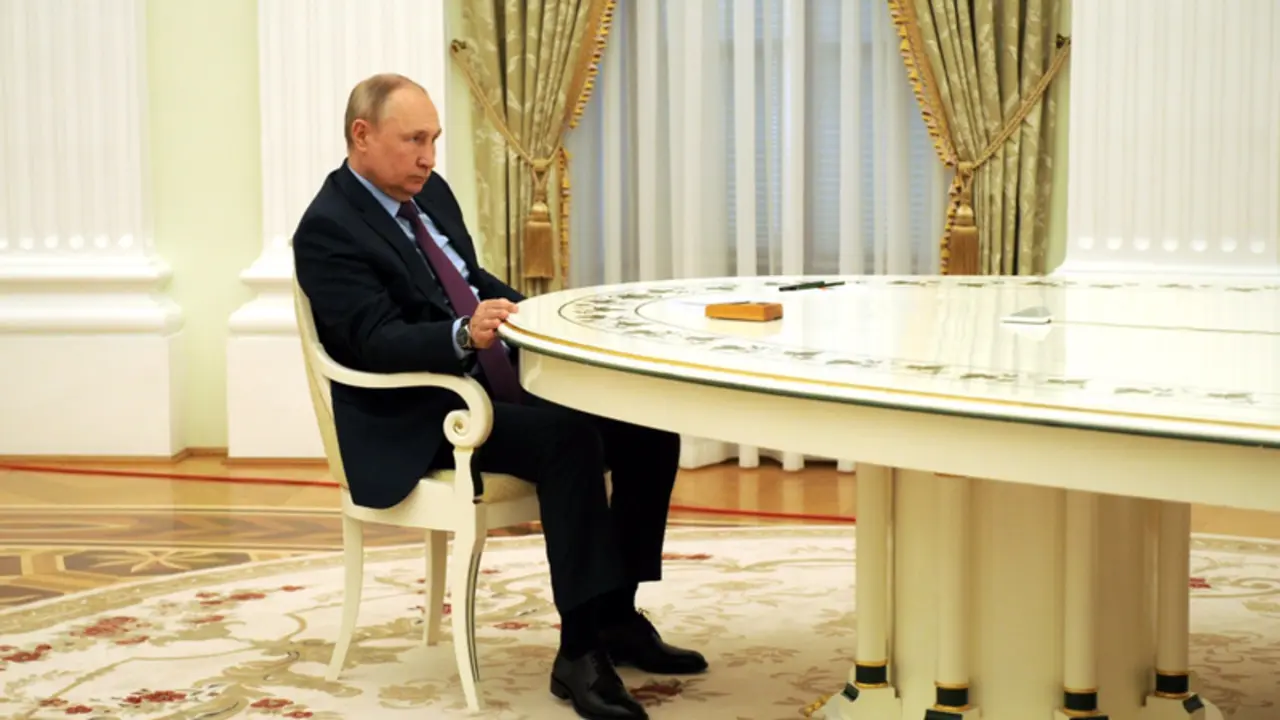 <p> HANDOUT - 22 February 2022, Russia, Moscow Russian President Vladimir Putin speaks with President of Azerbaijan Ilham Aliyev (not pictured) during their meeting at the Kremlin. Photo -Kremlindpa - ATTENTION. </p>