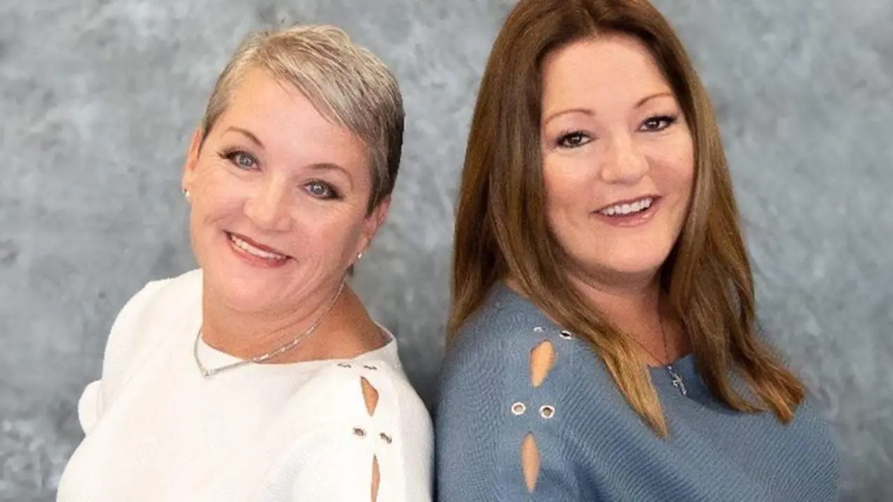 <p> twin-sisters-Michele-Dugan-and-Trish-Morgan-reunited-submitted-Realty-ONE-Group </p>