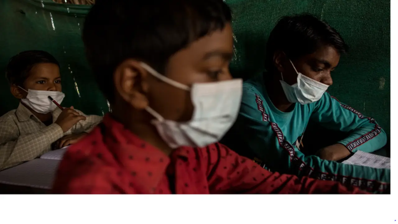 <p> Ni&ntilde;o en una escuela </p>