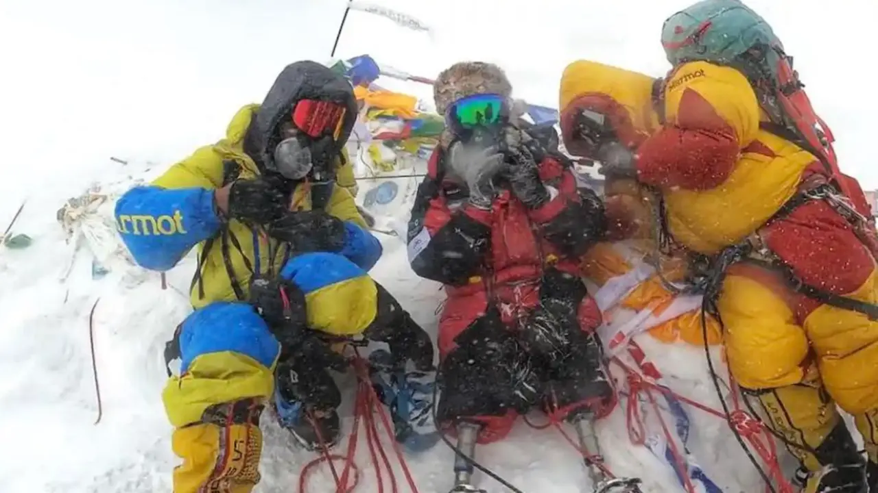  Hari Budha Magar (center) reaches Mt. Everest summit &ndash; courtesy of Shanta Nepali Productions 