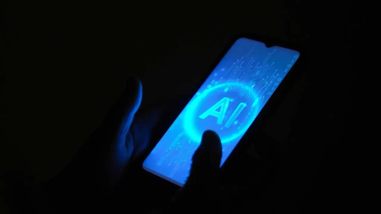 Archivo - Un m&oacute;vil con las siglas AI de Artificial Intelligence (Inteligencia Artificial)