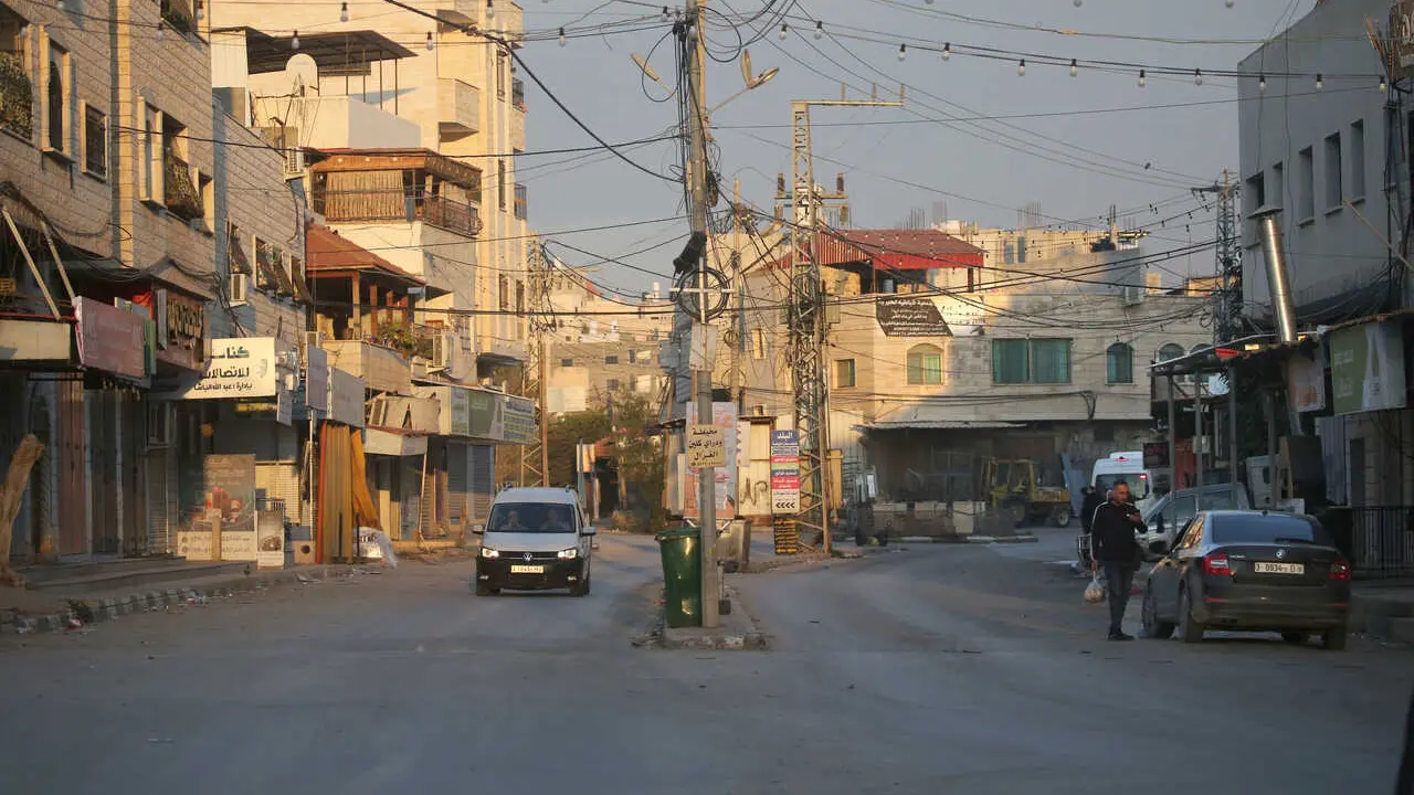 General view of the commercial market after the shops closed in the town of Qabatiya, south of Jenin in the northern West Bank. The Israeli army announced it was conducting operations in several locations in the West Bank following a Palestinian attack that killed an Israeli woman and wounded four others in the southern Israeli city of Beit She'an. The Israeli army raided the home of the Palestinian attacker in Qabatiya, and the Israeli Defense Minister ordered the army to carry out a large-scale operation and impose a siege on the town.
