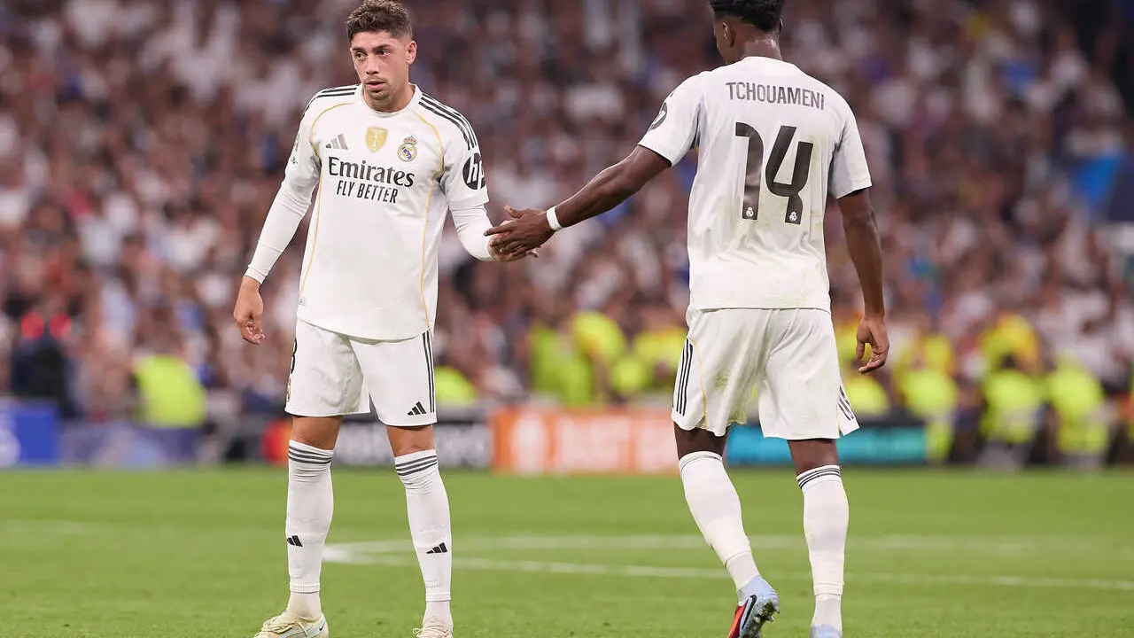 Federico Valverde (L) of Real Madrid CF and Aurelien Tchouameni (R) of Real Madrid CF are seen in action during the UEFA Champions League 2025/2026 first round day 1 football match between Real Madrid CF and Olympique de Marseille at Santiago Bernabeu Stadium. Final score: Real Madrid CF 2 : 1 Olympique de Marseille
