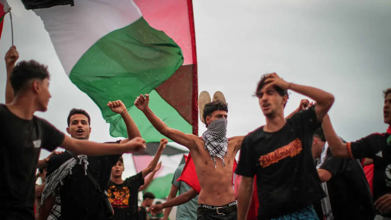 Supporters and activists of the Global Sumud Flotilla gather at the Tunisian port of Sidi Bou Said, ahead of the scheduled departure to the Gaza Strip to break Israel's blockade on the Palestinian territory on September 10, 2025. Organisers of the flotilla named 'Sumud', an Arabic word meaning steadfastness, which carries aid and pro-Palestinian activists, said late September 9 that another of their boats had been struck in a suspected drone attack off Tunisia's coast, adding the flotilla was due to resume its voyage on September 10 after multiple delays.