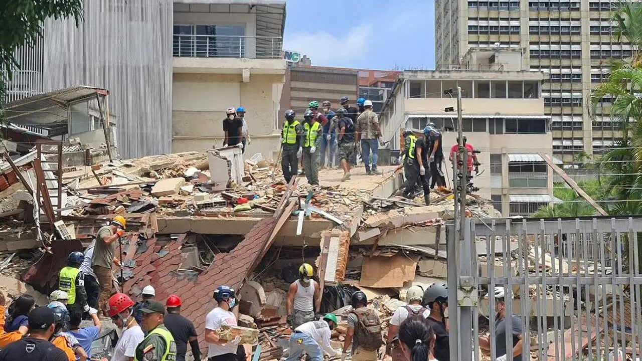 VENEZUELA, CARACAS - JUNE 26, 2026: First responders clear debris after an earthquake. According to Carlos Alvarado, Minister of the People's Power for Health, Venezuela earthquake on 24 June killed 235 people and injured over 4,300. Video grab. Best quality available. Mikhail Makeyev/TASS