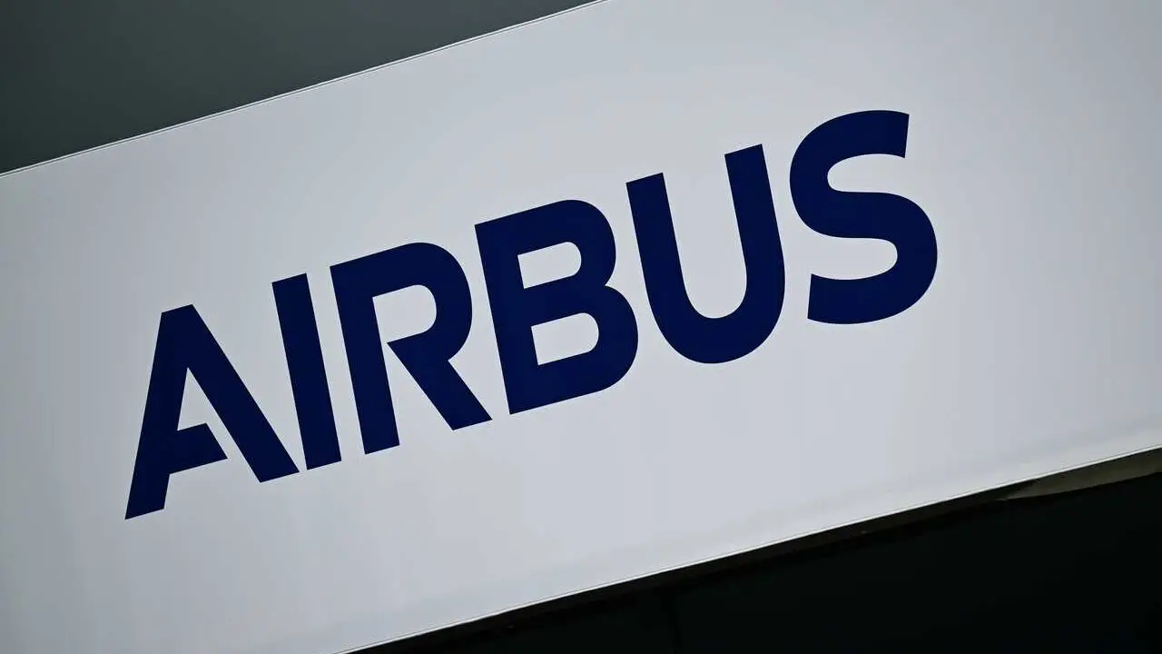 FILED - 12 June 2026, Brandenburg, Schoenefeld: FILE PHOTO - The 'Airbus' logo is visible on a building at the Berlin ExpoCenter Airport during the International Aerospace Exhibition (ILA). Photo: Sebastian Christoph Gollnow/dpa
