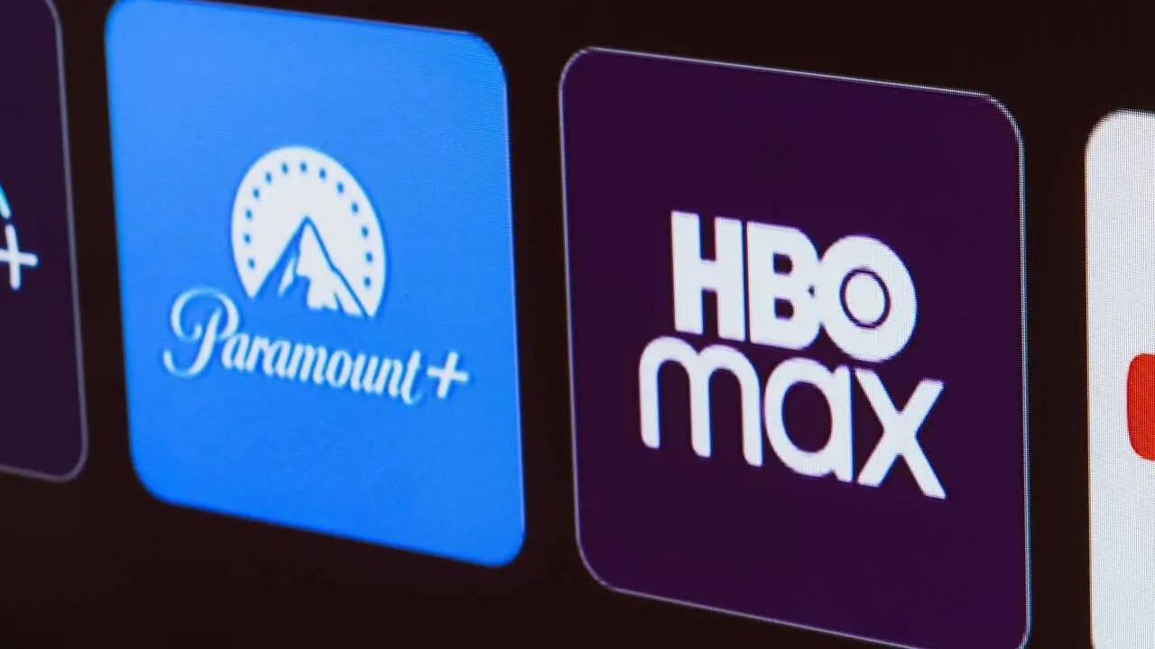 In this photo illustration the Apple TV, Disney Plus, Paramount Plus, HBO Max and YouTube logo is displayed on a TV screen.