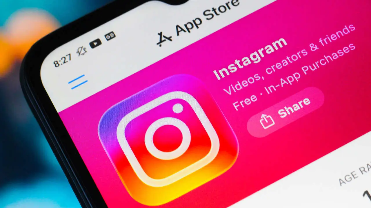 In this photo illustration, the Instagram logo is seen displayed on a smartphone screen in the Apple app store.