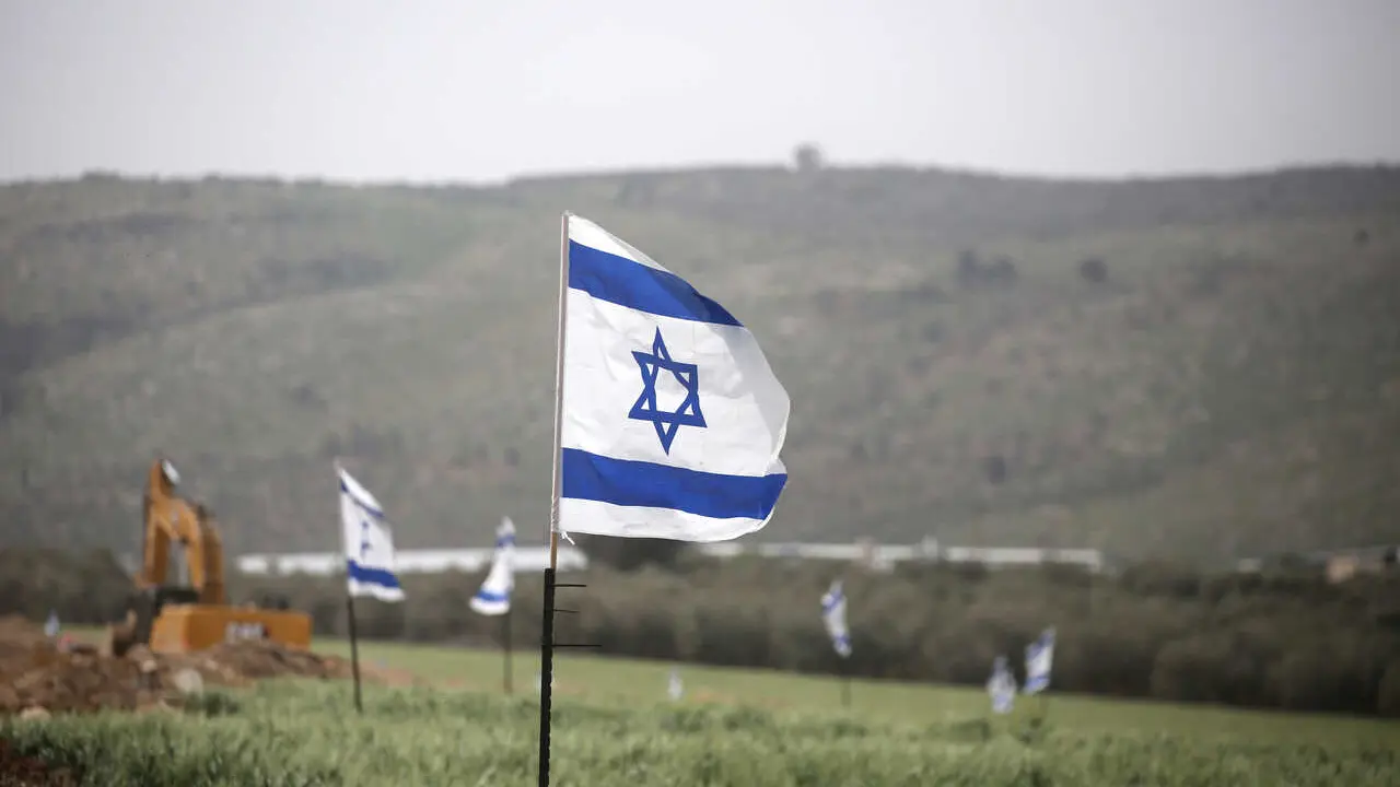 An Israeli bulldozer seen razing Palestinian-owned land near the Jewish settlement of Snanur. Jewish settlers have returned to their abandoned settlement and raised Israeli flags around the Snanur settlement, south of Jenin in the West Bank. Snanur was one of four settlements in the northern West Bank evacuated in 2005 as part of the ''disengagement'' plan.